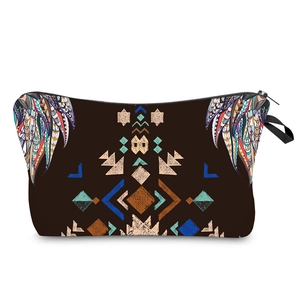 Detail view of bohemian geometric pattern print on a canvas travel makeup bag