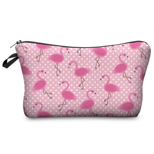 Close-up of pink flamingo and white polka dot print on durable neoprene makeup bag