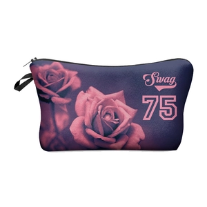 Close-up of deep purple makeup bag with pink rose print and sturdy black zipper detail