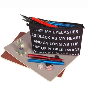 Portable black canvas makeup bag with white alphabet print and zipper closure for travel