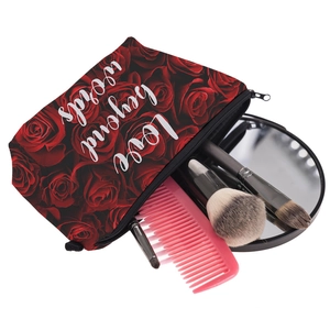 Floral makeup bag with red rose print and Love beyond words quote with beauty accessories