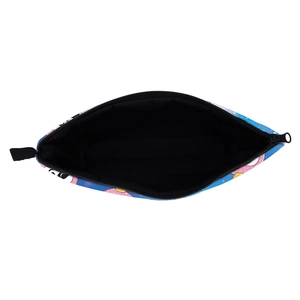 Top-down view of a makeup bag with blue donut prints and spacious black interior