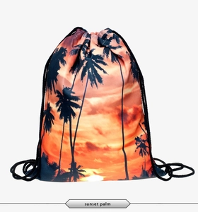 Macro view of drawstring closure and sunset palm tree print on waterproof storage bag