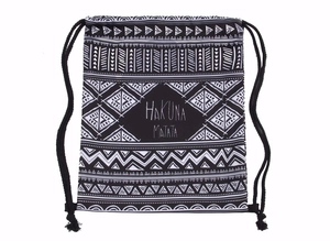 Ethnic geometric print drawstring backpack featuring Hakuna Matata design in black and white