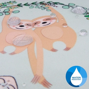 Detail shot of water resistant fabric showing clear droplets on the sloth pattern print