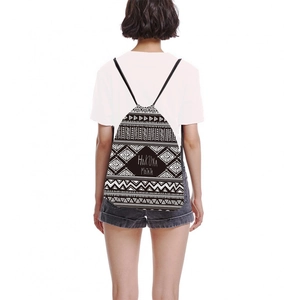 Drawstring backpack with geometric tribal print and Hakuna Matata slogan on white background