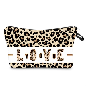 Leopard print makeup bag with LOVE YOU lettering and black zipper on white background