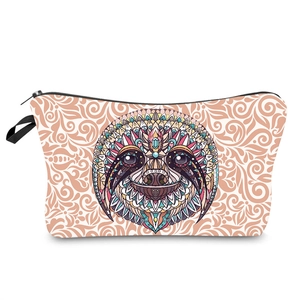 Detailed view of bohemian sloth print makeup bag with mandala pattern and wristlet strap