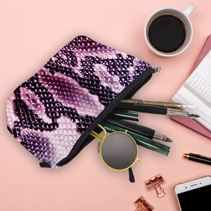 Digital snakeskin print makeup bag with purple patterns and black zipper for travel