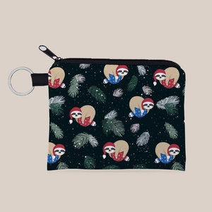 Detail of Christmas sloth coin purse with silver keychain ring and durable zipper