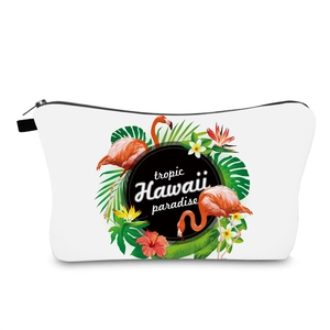 Detail of tropical canvas makeup bag with pink flamingo and hibiscus flower print