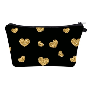 Digital heart print cosmetic bag in black with gold glitter heart patterns for travel