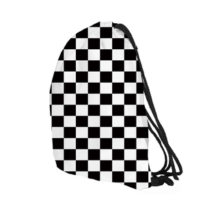 Detail of checkered drawstring bag featuring black and white pattern with polyester texture