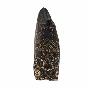 Side view of black makeup bag with golden mandala patterns and a black zipper closure