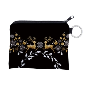 Close-up of reindeer pattern coin purse with golden geometric deer and snowflake print
