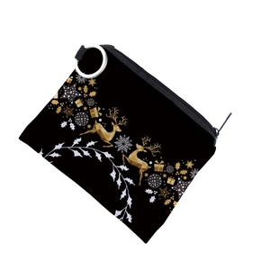 Close-up of reindeer print on black waterproof coin purse with silver zipper puller