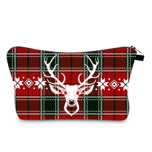 Christmas reindeer print makeup bag with red and green plaid pattern and zipper closure