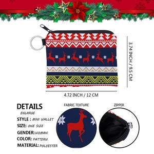 Mini Christmas coin purse with reindeer pattern, zipper closure and metal keychain