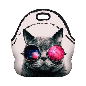 Detailed close-up of a neoprene lunch bag featuring a cool cat with galaxy sunglasses print