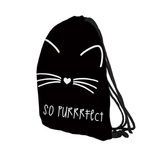 Detail of black drawstring bag with white cat print and So Purrrrfect text engraving
