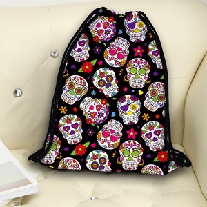 Multifunctional drawstring backpack featuring colorful Mexican sugar skull and floral patterns