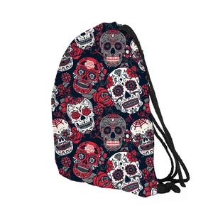 Detail of Day of the Dead sugar skull and red rose print on blue drawstring backpack