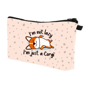 Detail view of water-resistant Corgi makeup bag with zipper and printed graphic