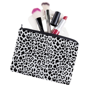 Portable leopard print makeup bag with black zipper for travel and beauty tools storage