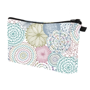 Detail of water-resistant fabric with colorful floral mandala print and black zipper