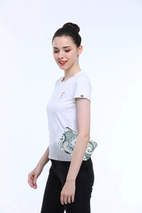 Water-resistant travel makeup bag with blue mandala floral patterns held by a model