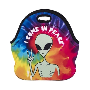Detail view of tie-dye neoprene lunch bag with alien print and I Come In Peace text