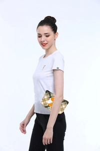 Flat makeup bag with Corgi print and yellow-green checkered pattern shown by model