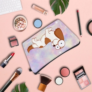 Detailed view of Corgi dog print makeup bag with stylish cosmetic accessories layout