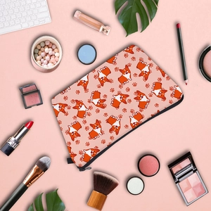 Detail view of water-resistant fabric makeup bag with cute cartoon Corgi patterns