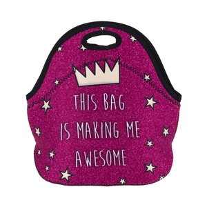 Detail of glitter pink lunch bag with crown design and This Bag Is Making Me Awesome text