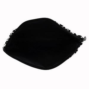 Portable cow print cosmetic travel bag with zipper closure and spacious interior