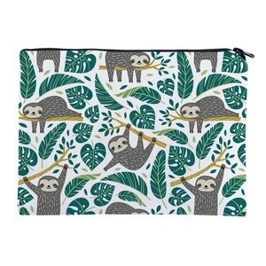 Detail of square cosmetic bag featuring cartoon sloth prints and durable black metal zipper
