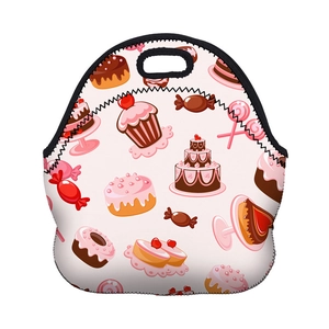 Detail view of pink neoprene lunch bag with colorful sweets and cupcake illustrations