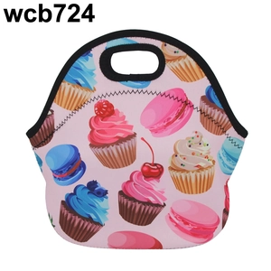 Macro view of waterproof neoprene lunch bag with colorful cupcake and macaron patterns