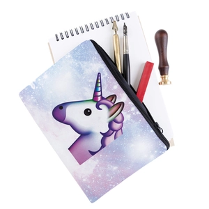 Detailed close-up of a unicorn makeup bag with purple starry pattern and durable black zipper