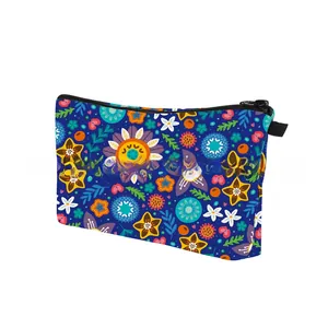 Detail of waterproof makeup bag featuring vibrant floral patterns and secure black zipper
