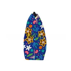 Detail view of water-resistant floral makeup bag with vibrant stars and tropical prints