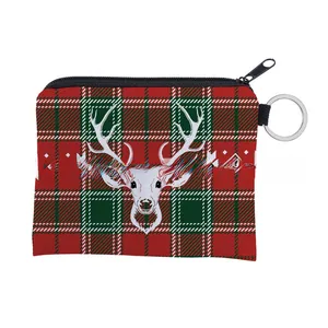 Detail of waterproof Christmas reindeer coin purse with red plaid and keychain ring