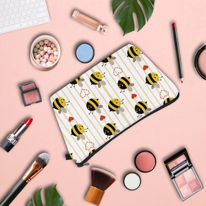 Borsa da trucco con api e cuori su strisce gialle per organizzazione viaggio