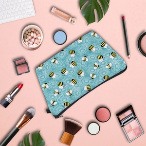 Waterproof travel cosmetic bag with cute bee print and smooth zipper closure
