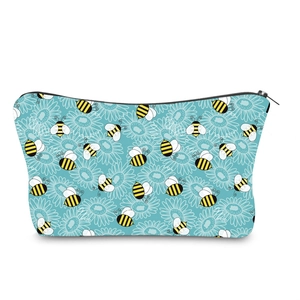 Detail of bee and white floral pattern on a water-resistant teal makeup pouch