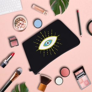 Trousse à maquillage imperméable Evil Eye en toile avec fermeture éclair sur fond rose