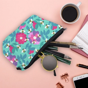 Close-up of waterproof bee print pouch showing spacious storage for makeup and accessories