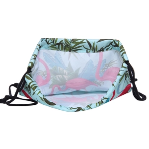 Detailed view of lightweight drawstring bag featuring pink flamingo and palm leaf prints