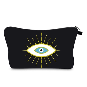 Détail de la trousse de maquillage imperméable avec motif œil et fermeture éclair